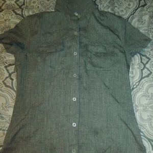 Magellan brand collar shirt. Size extra small,grey in color.